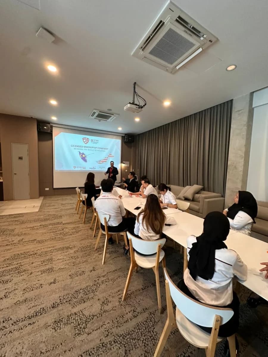 MalaysiaVisaExpert.com 团队在签证及居留活动现场，照片 5